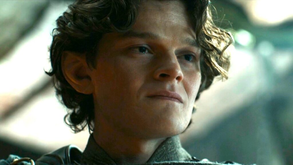 Robert Aramayo as Elrond before he kisses Galadriel in The Rings of Power season 2