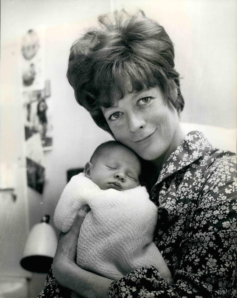 Dame Maggie with baby son Toby in 1969