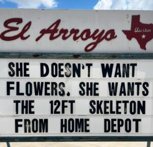 hilarious El Arroyo ATX sign Halloween skeleton