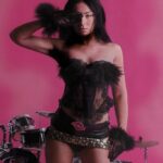 Charli XCX rocked out in black lace for a sexy shoot