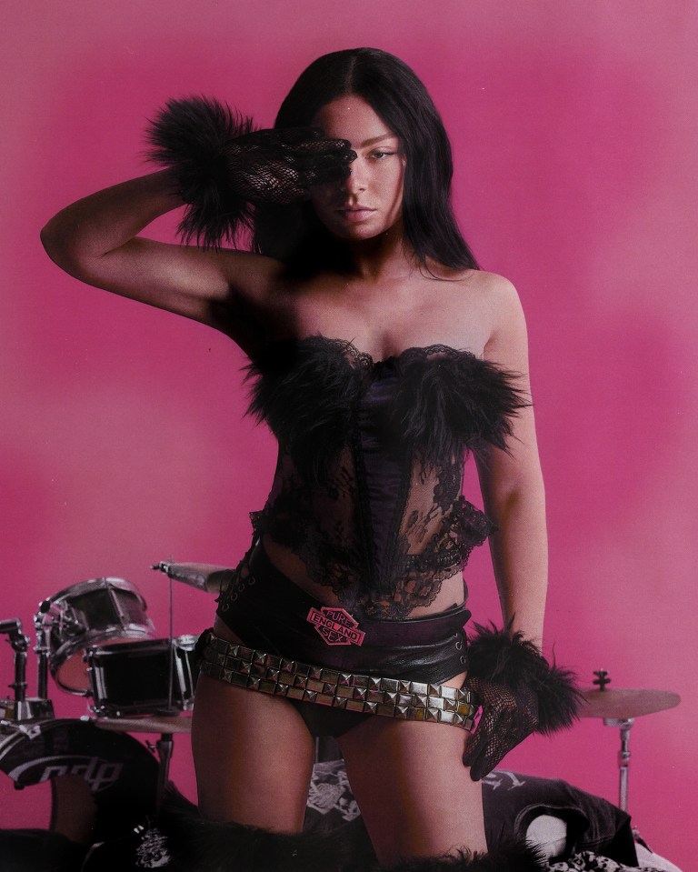 Charli XCX rocked out in black lace for a sexy shoot