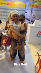 Cardi B holding her son Wave at his third birthday party over the weekend