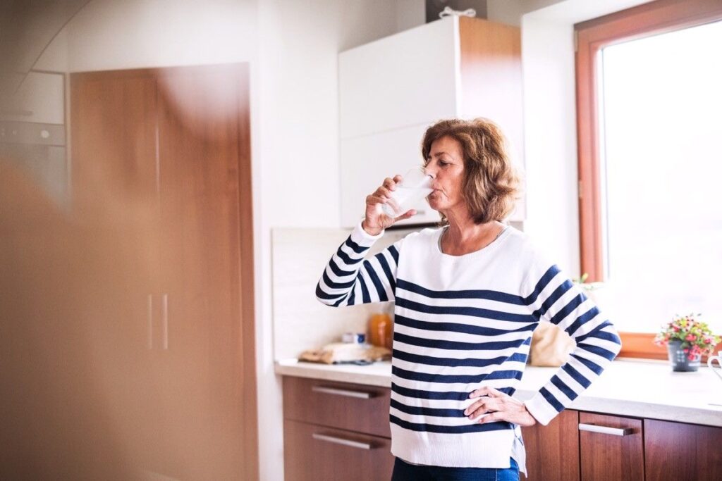 A woman drinking water