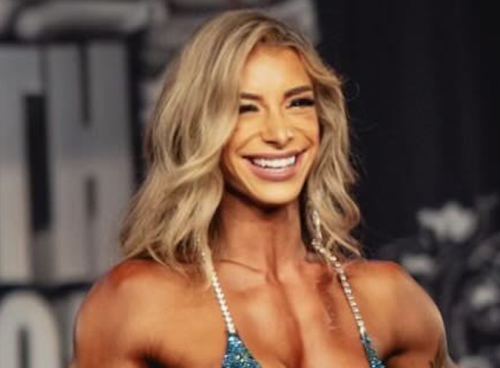 IFBB Wellness Pro Maddy Forberg in Two-Piece Workout Gear Says "Lift and Learn"