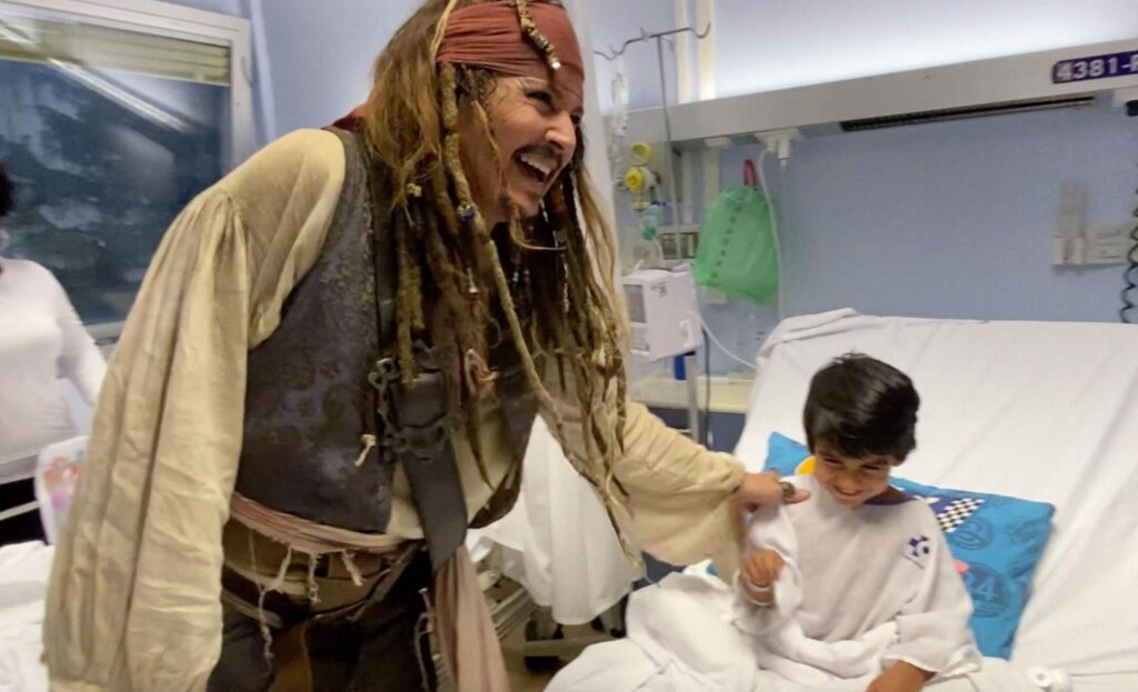 Johnny Depp dresses up as Captain Jack Sparrow to visit children in hospital in Spain