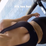 Kylie Jenner takes a video while working out.