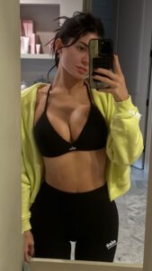 Kylie stunned as she showed off her abs in a plunging sports bra