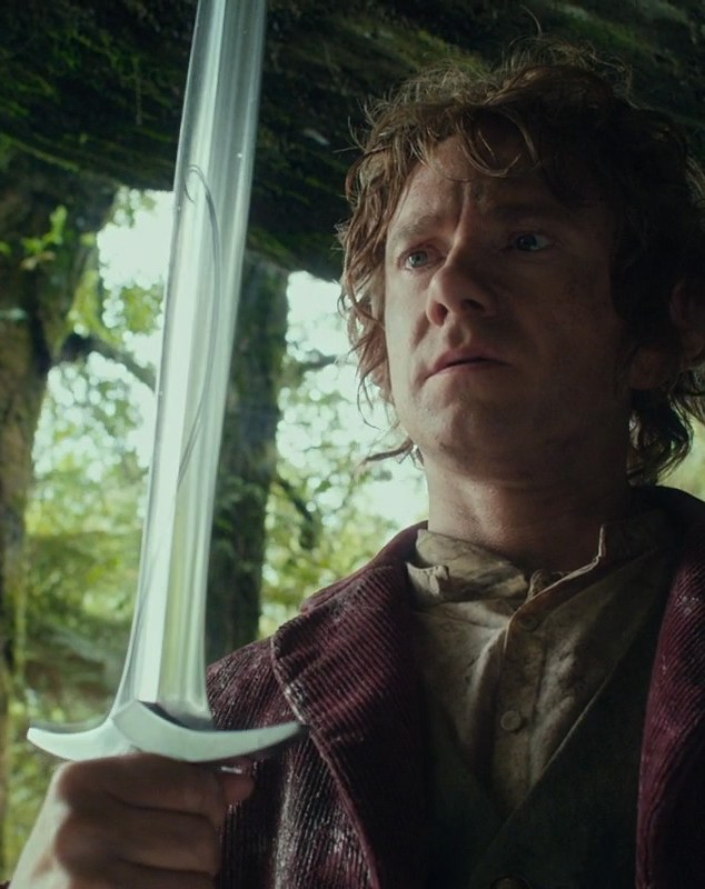 Martin Freeman as Bilbo holding Sting in The Hobbit: An Unexpected Journey.