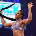 WWE's Bianca Belair in Two-Piece Workout Gear Flexes Her Bicep