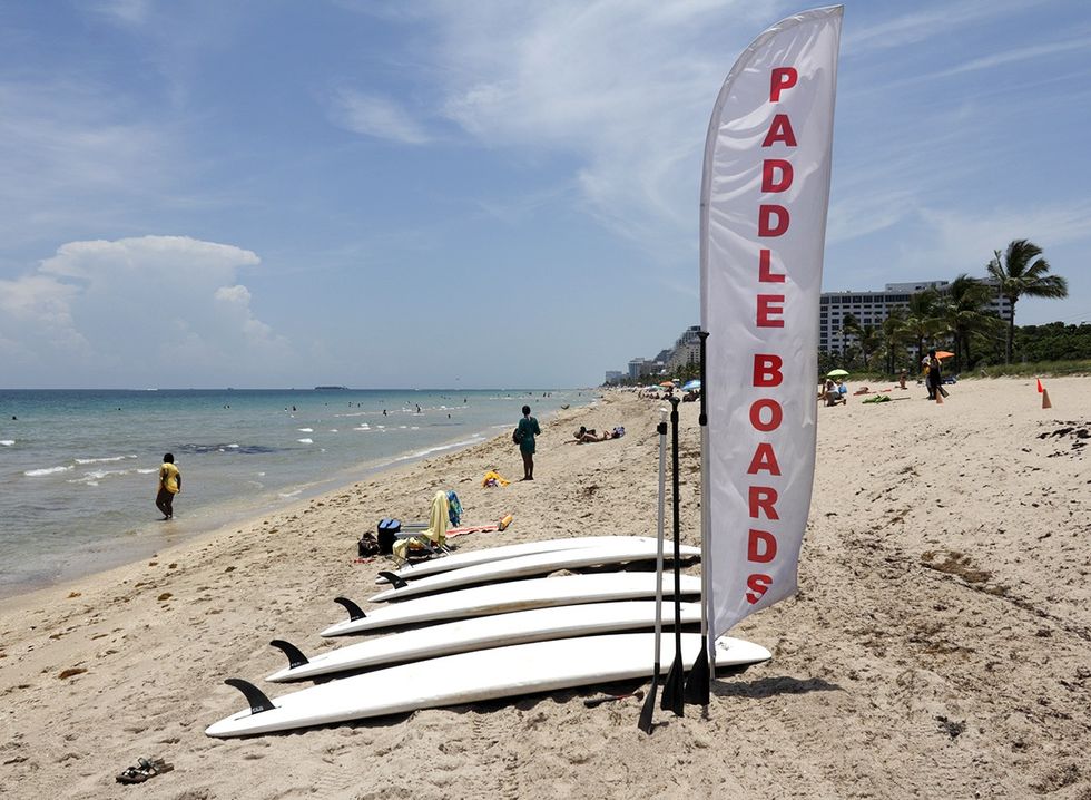 Paddleboards for rent on a beach