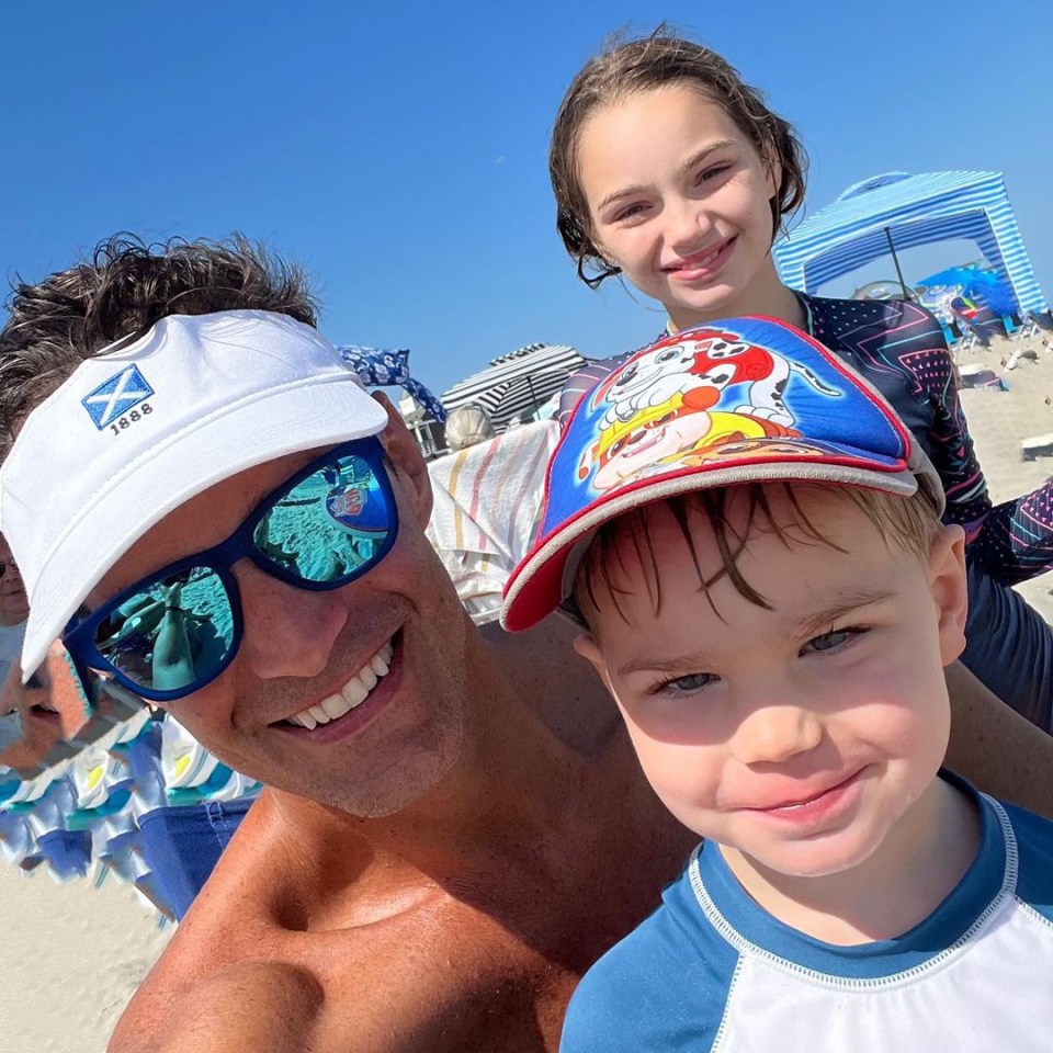 Rob Marciano posed with his two kids at the beach