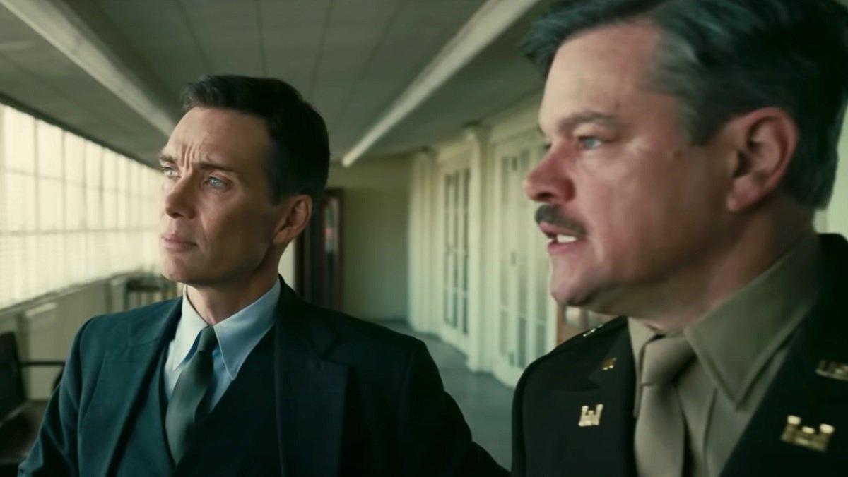 Cillian Murphy and Matt Damon look upset and worried in Oppenheimer.