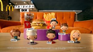 McDonald's burger, fries, and a drink with figures of Friends characters.