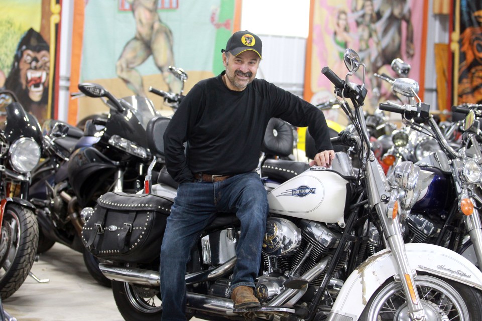 Frank Fritz showing off his motorcycle collection at his Davenport, Iowa home in 2021