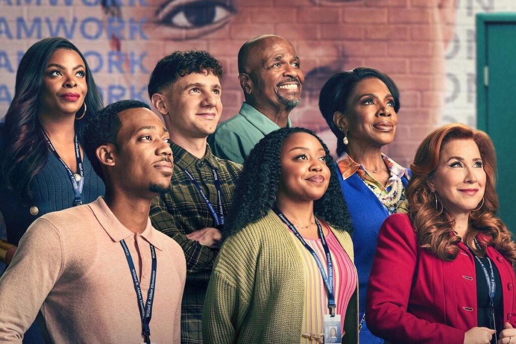 A cast photo of Abbott Elementary with everyone looking to the side together