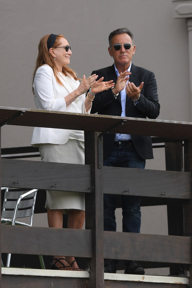 Jessica's dad Bruce is seen with her mum Patti cheering her on at a competition