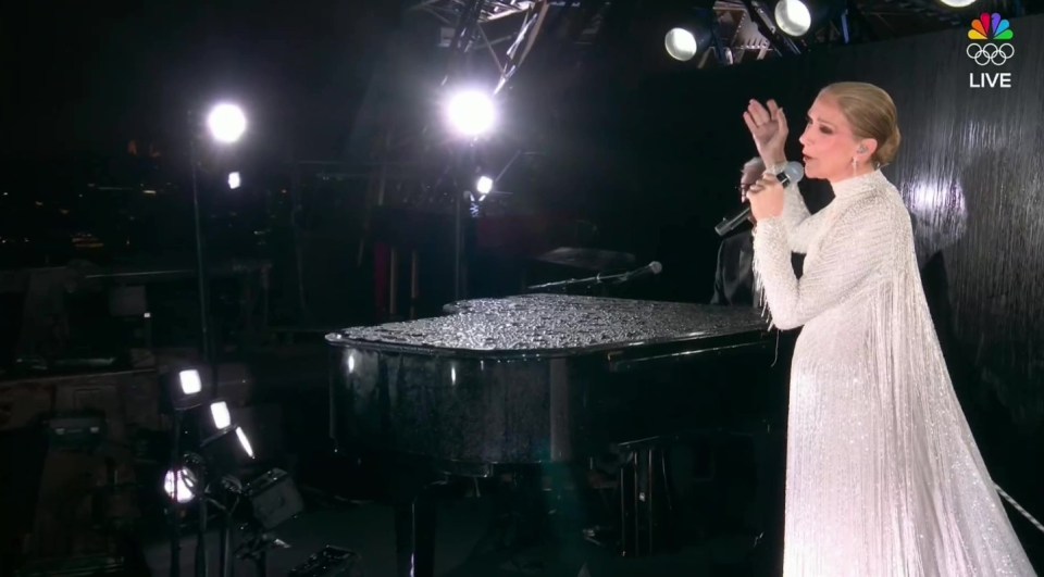 Dion appeared to hold back tears during the performance