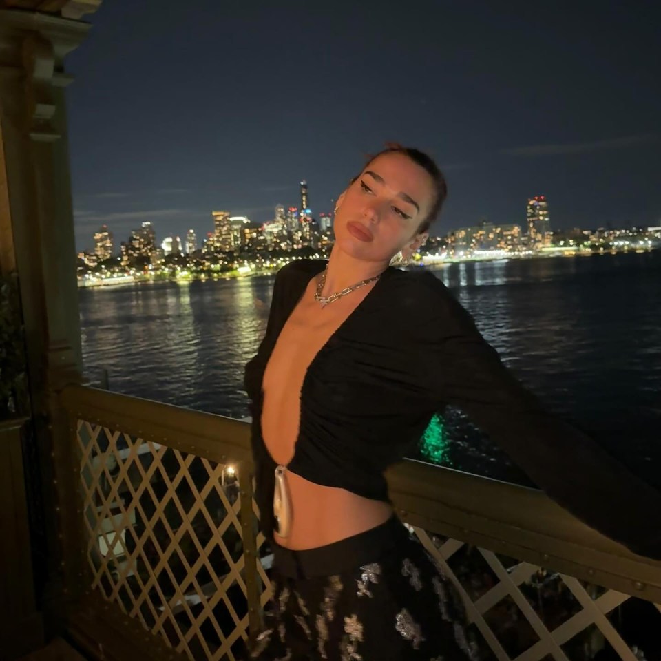 In nighttime shots, Dua flashed her cleavage