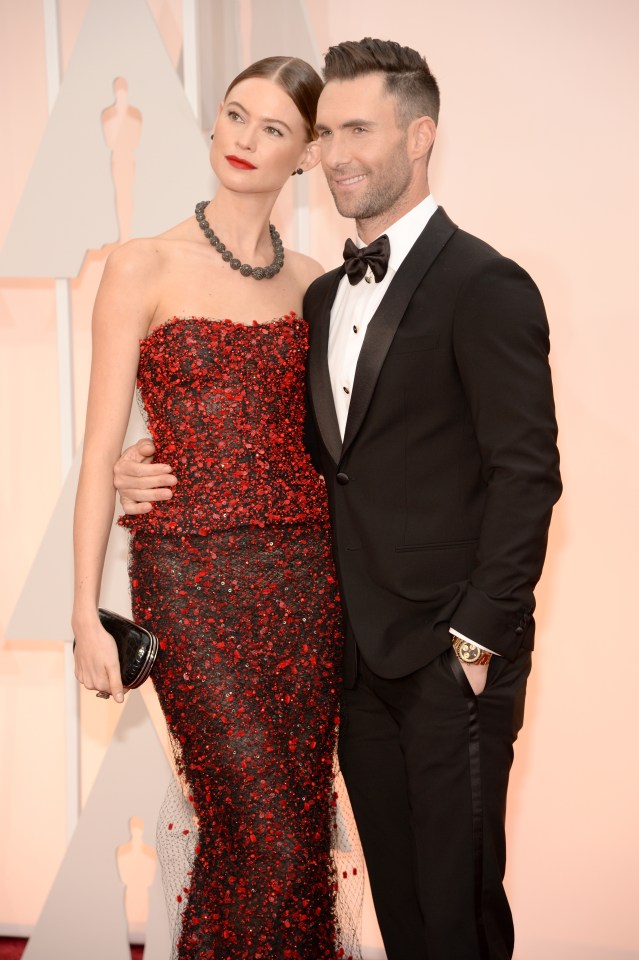 Behati married Adam Levine in 2014