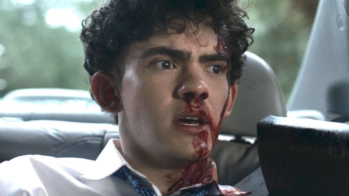 A bloodied William Kaplan who is now Billy Maximoff in a car on Agatha All Along