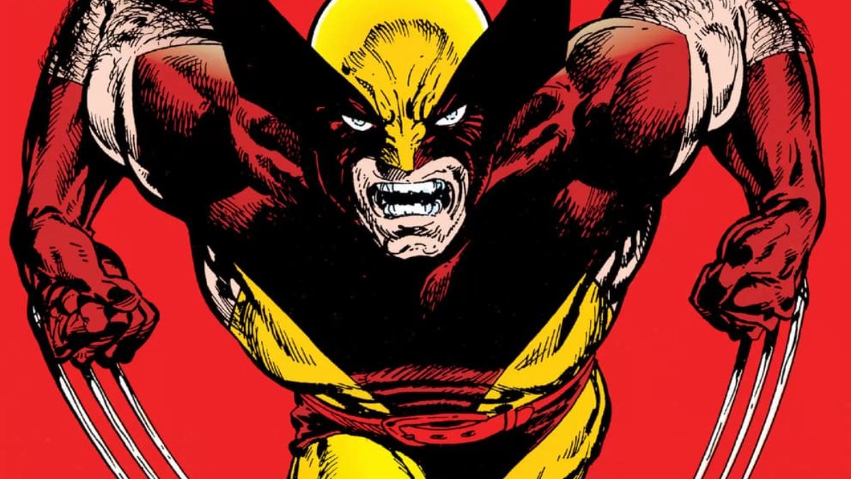 Wolverine in comic wearing brown and yellow suit.