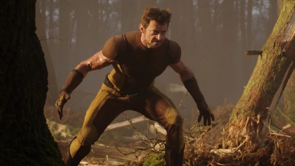 Wolverine in Deadpool & Wolverine wearing brown, tan, and yellow suit.