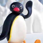 Pingu the Penguin in the South Pole waving.