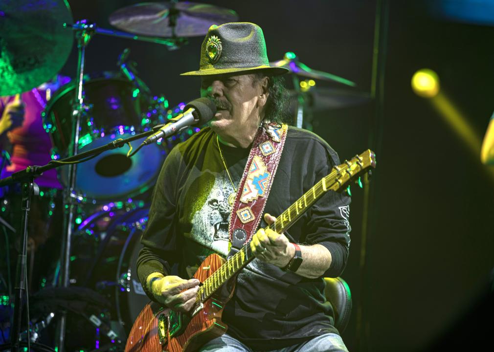 Carlos Santana performs on stage during the Oneness Tour 2024.