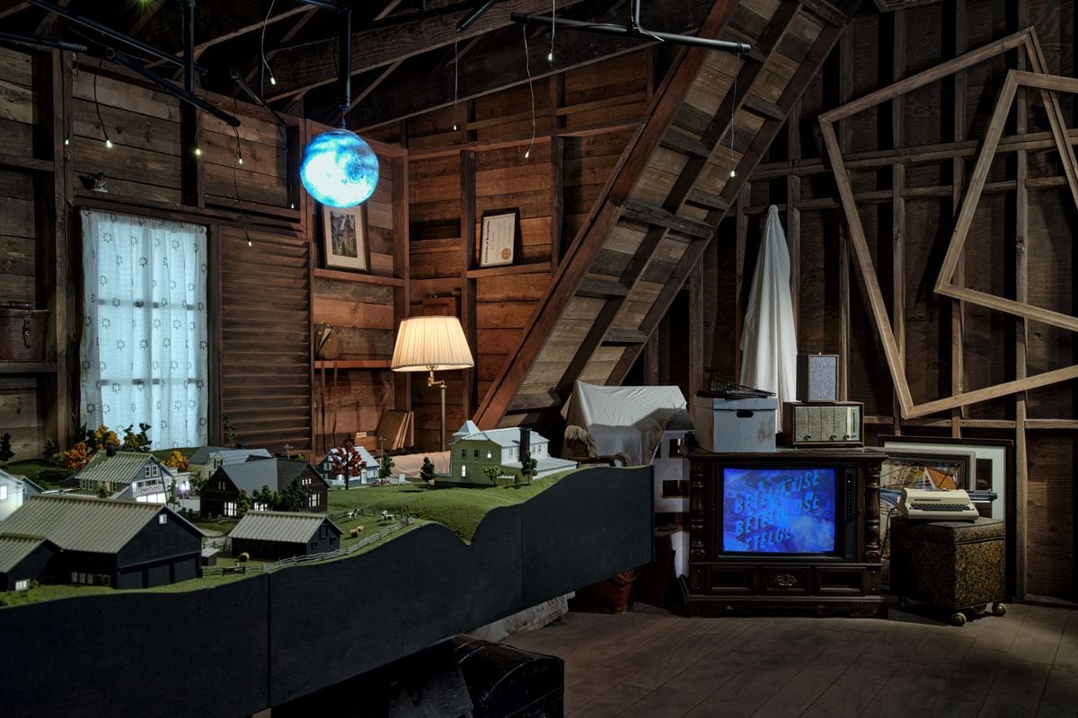 The attic in the Beetlejuice home, with the famous model home