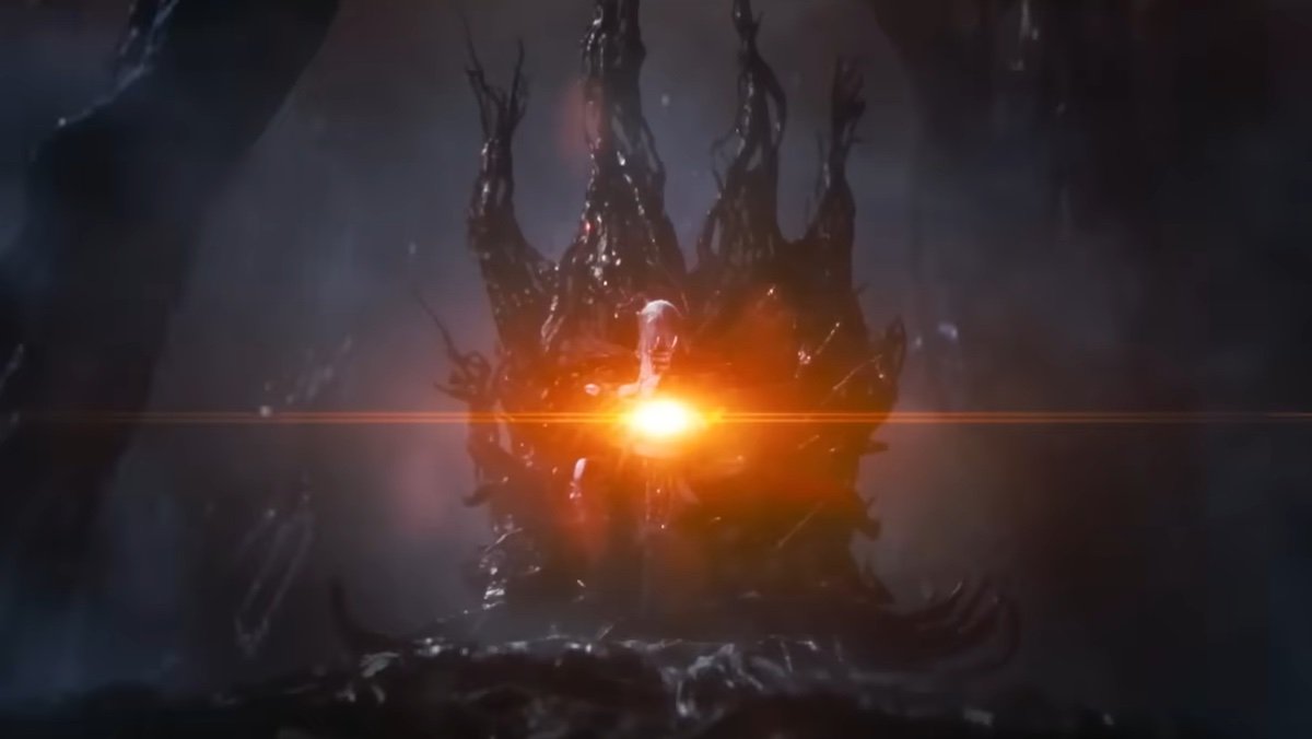 Knull seen sitting on his throne from afar with light coming out of his sword in Venom: The Last Dance