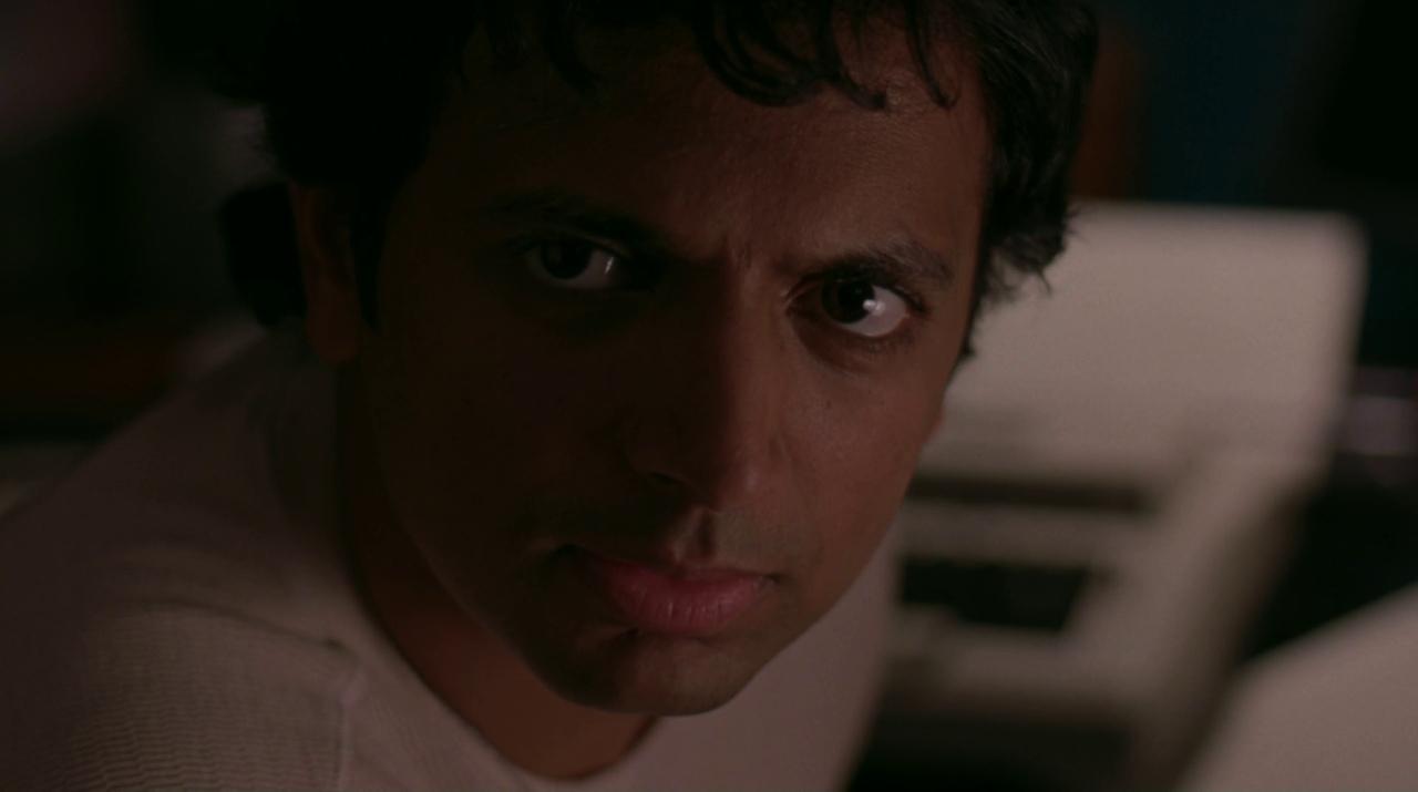 A close up on M. Night Shyamalan in Lady in the Water 