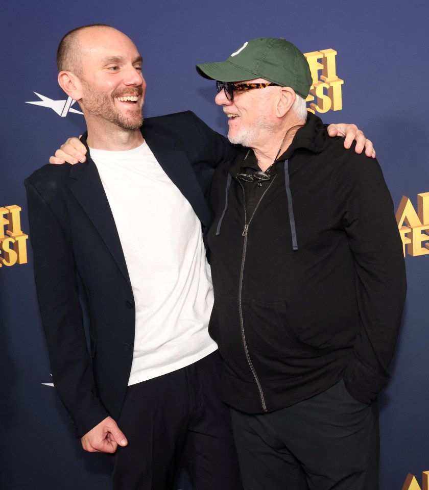 Charlie is all smiles with his dad Malcolm