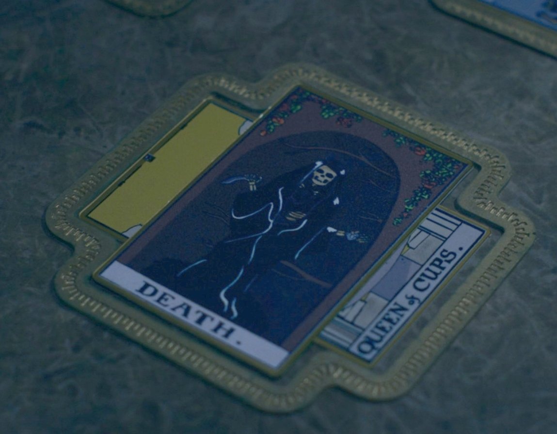 death card in agatha all along on a table