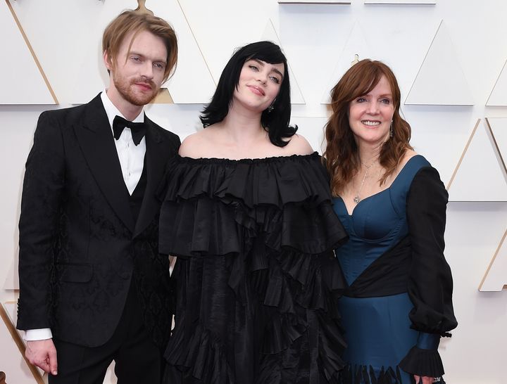 Finneas O'Connell, Billie Eilish and Maggie Baird at the 2022 Oscars.