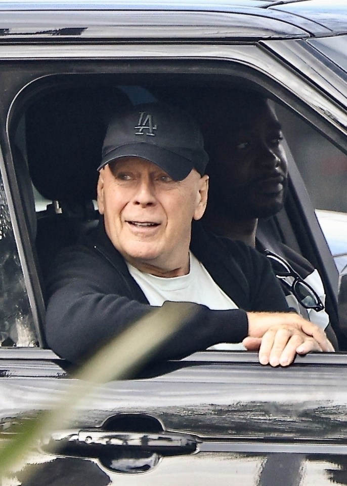 Bruce Willis was spotted flashing a smile as he enjoyed a drive around Studio City, Los Angeles