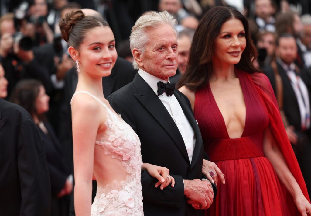 Carys Zeta Douglas, Michael Douglas, and Catherine Zeta-Jones attend the "Jeanne du Barry" Screening & opening ceremony on the red carpet at the 76th annual Cannes Film Festival at Palais des Festivals on May 16, 2023, in Cannes, France. (Photo by Vittorio Zunino Celotto/Getty Images)