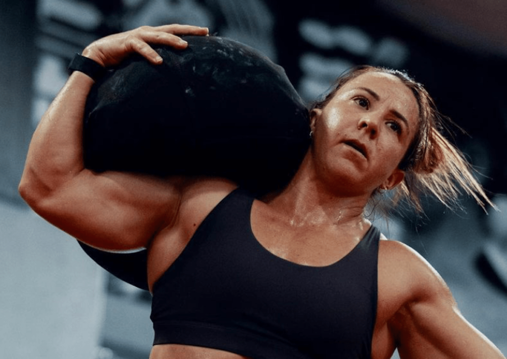 CrossFit Sensation Kara Saunders in Two-Piece Workout Gear Works Out in the Rain