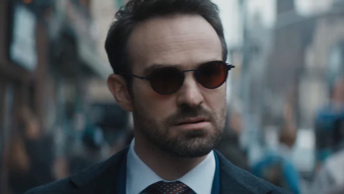 Matt Murdock with red glasses in a suit and jacket on Daredevil: Born Again