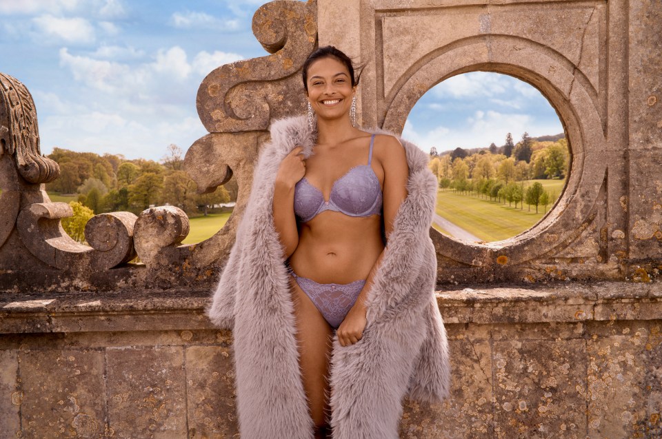 Devyn Garcia is all fur coat but with knickers as she poses in lavender underwear