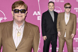 Elton John wears his old kneecap as a necklace after health scare