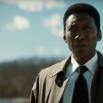 Mahershala Ali standing in an open field in True Detective season 3