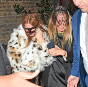 Isla Fisher looked all partied out outside a celeb haunt