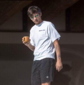 Louis was snapped looking low in Malibu on a family holiday