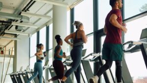 group of gym goers on the treadmill