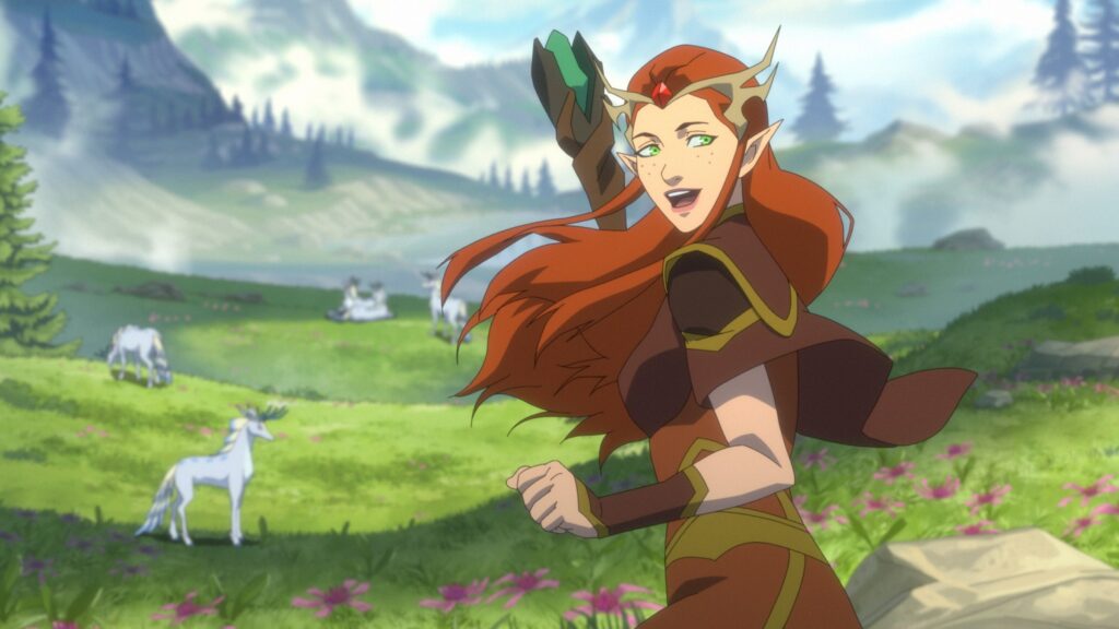 Keyleth standing in front of a lush green meadow, looking over her shoulder as her hair blows in the wind in The Legend of Vox Machina