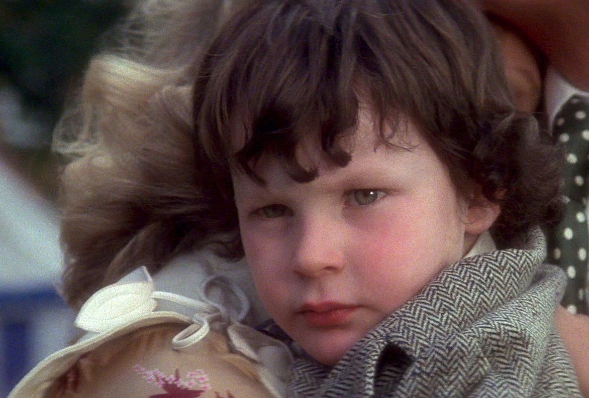 The Omen: Kid Damian stares down some people