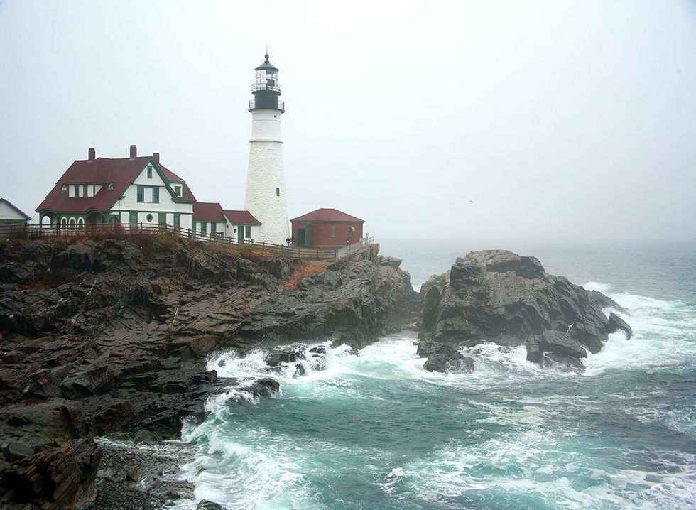 A New England light house in a storm