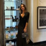 Victoria posed in a plunging black dress during a shopping trip in LA