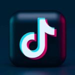 TikTok logo on a dark background