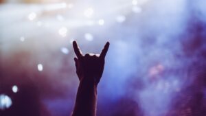 heavy metal fan showing horns